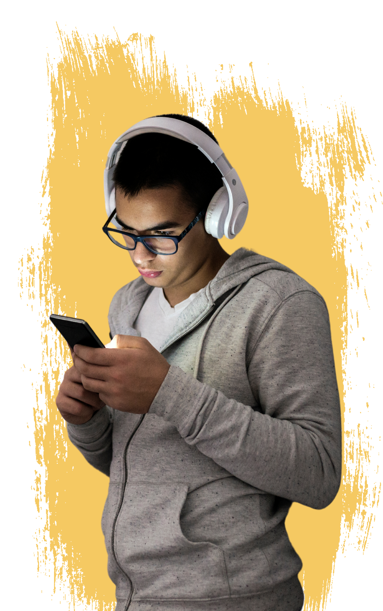 A young man looking at this phone, with headphones on