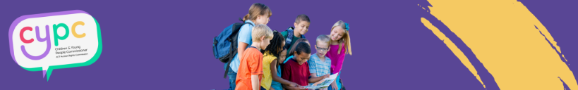 A group of children reading a magazine