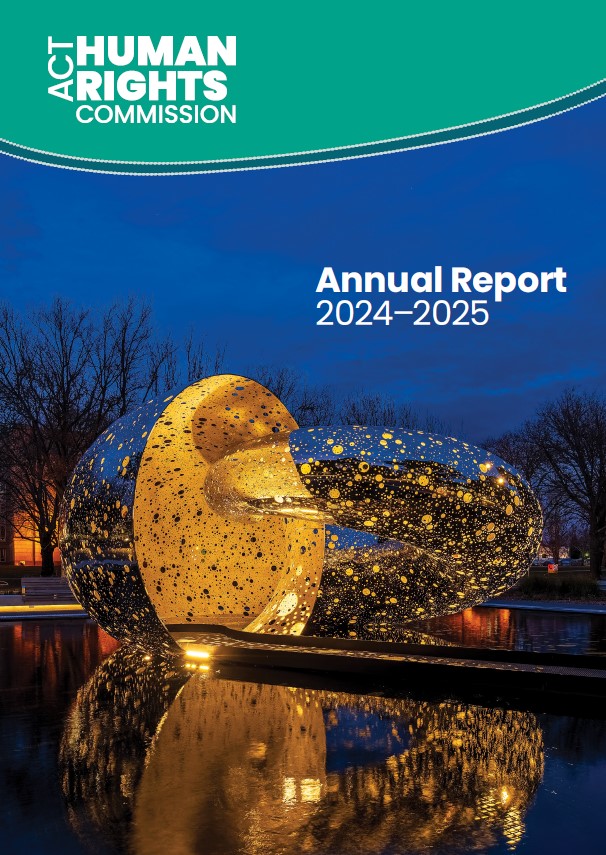 Cover of the annual report shows the Ouroboros art work at night